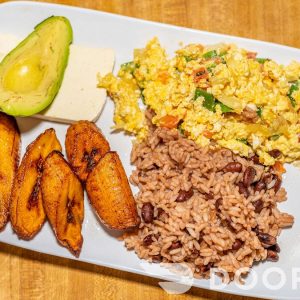 Desayuno Tazumal. rice and beans,fried sweet plantain, scrambled eggs w tomato,onion,peppers, salvadoran chesse,avocado