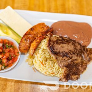 Plato Típico. carne asada,chorizo,rice,refried beans,salvadoran cheese,avocado,tomato relish