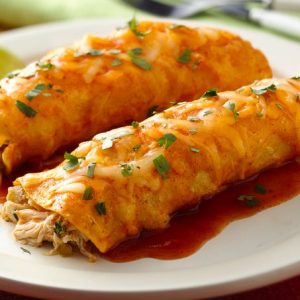 Enchilada de Pollo. 2 per order chicken, lettuce,tomato,cucumber,grated cheese, mayo-ketchup